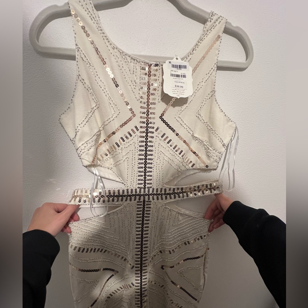 Super cute mini dress with side cut outs
